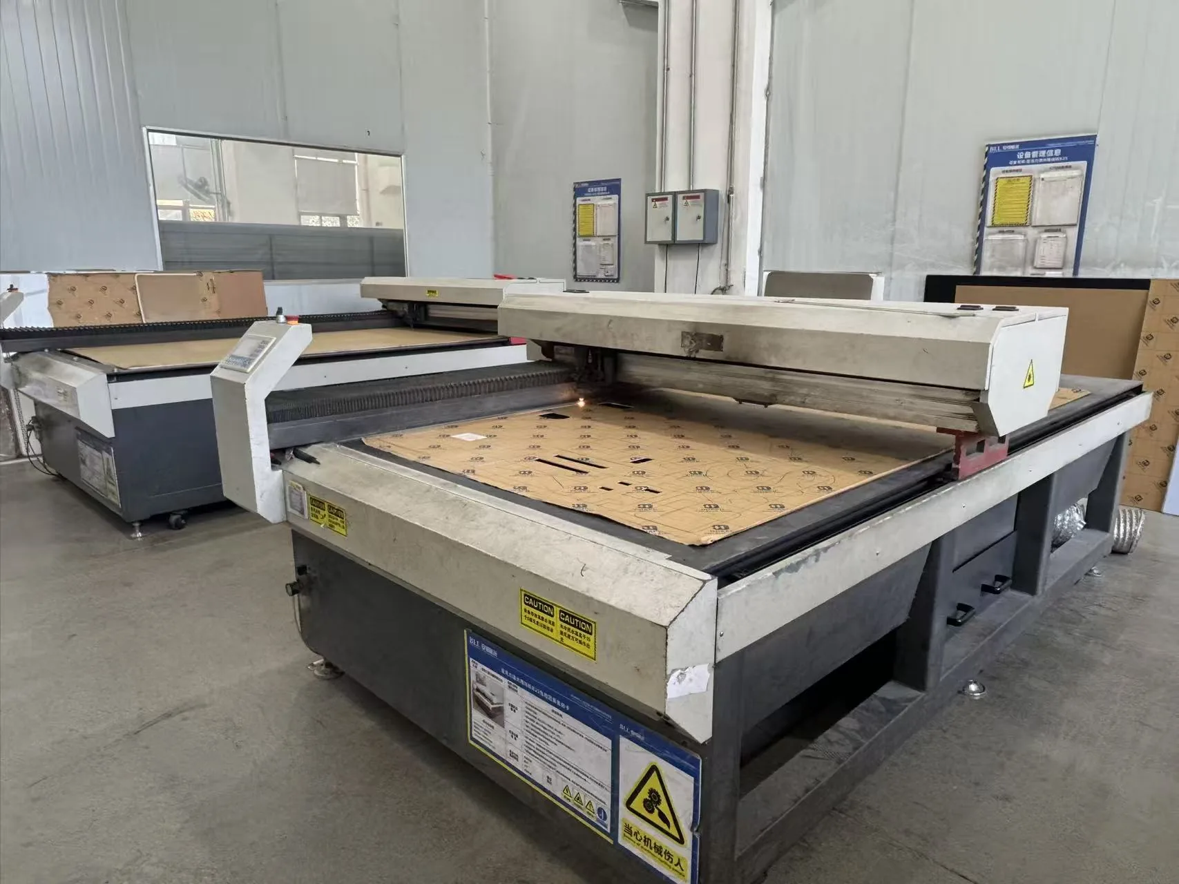 Laser cutting acrylic sheets for custom display and signage production