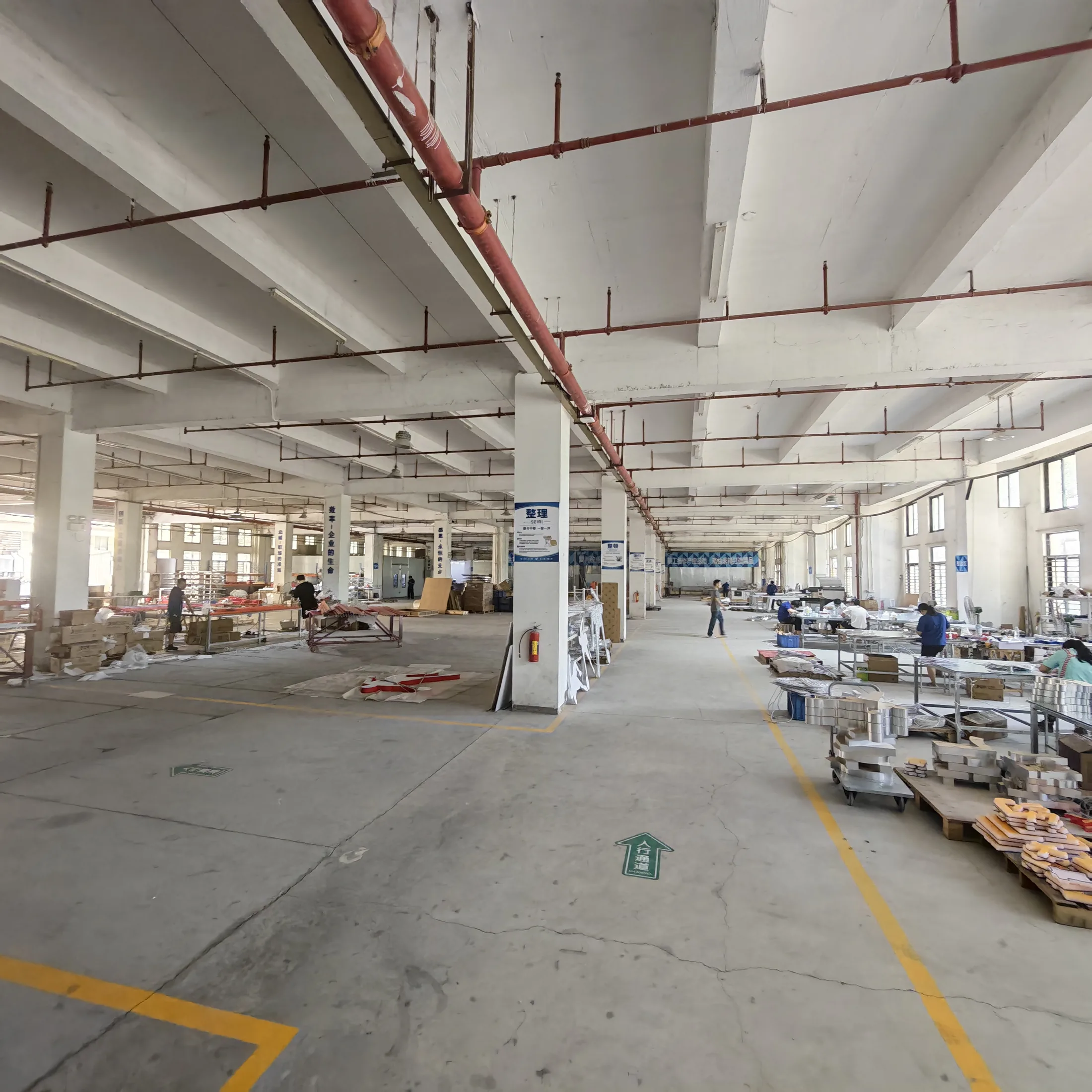 Factory workshop for custom signage acrylic fabrication and commercial display production